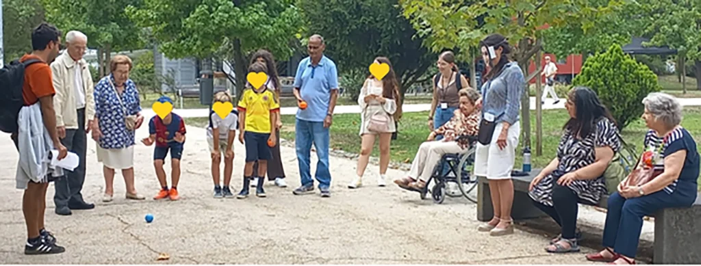 grupo de adultos e criancas num peddy paper